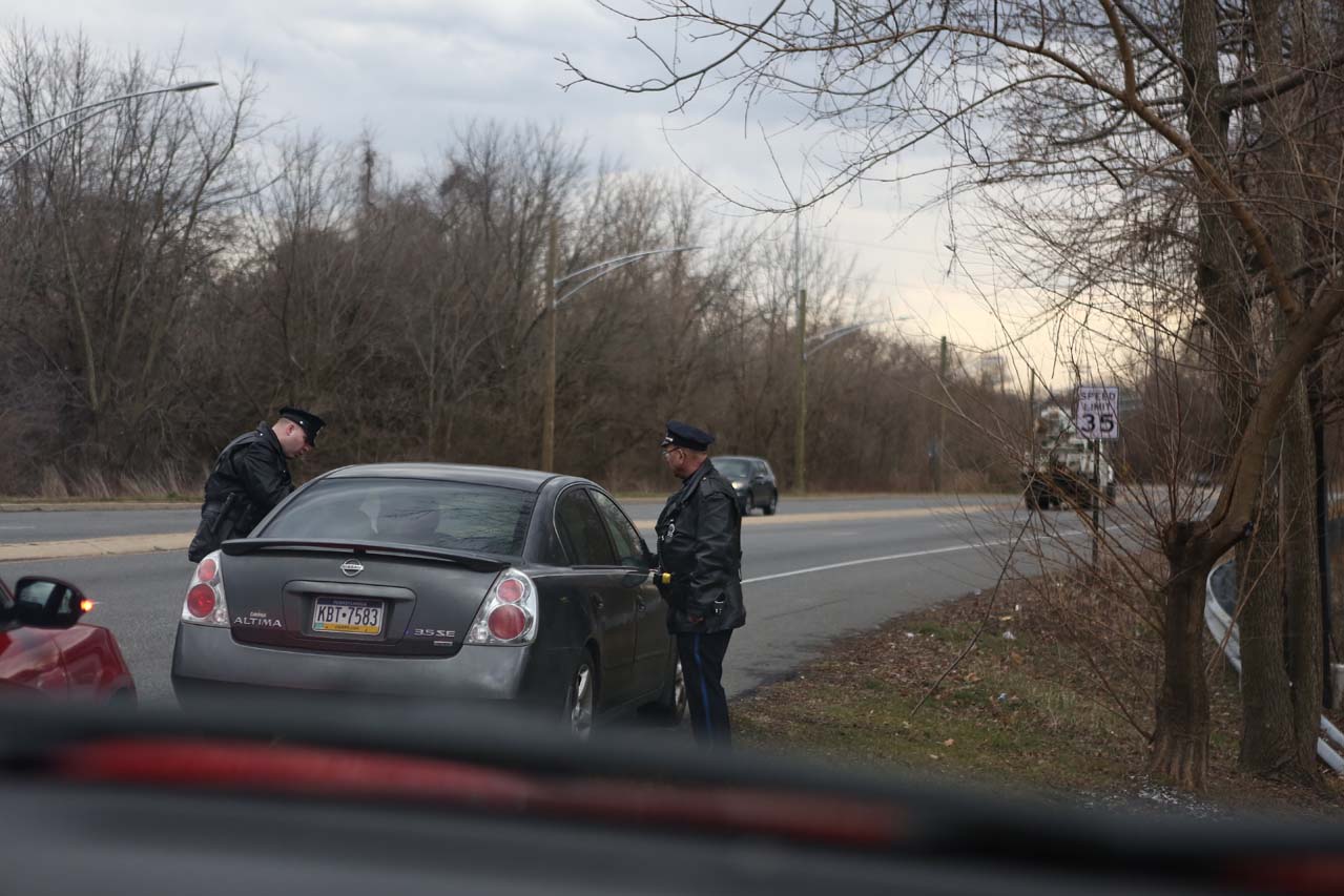 Two police at a traffic stop