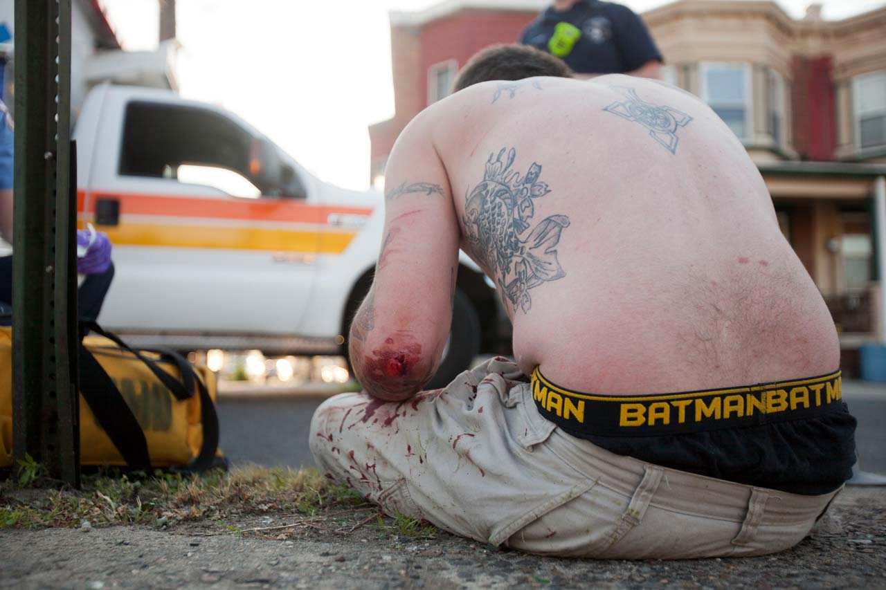 Man injured on a sidewalk